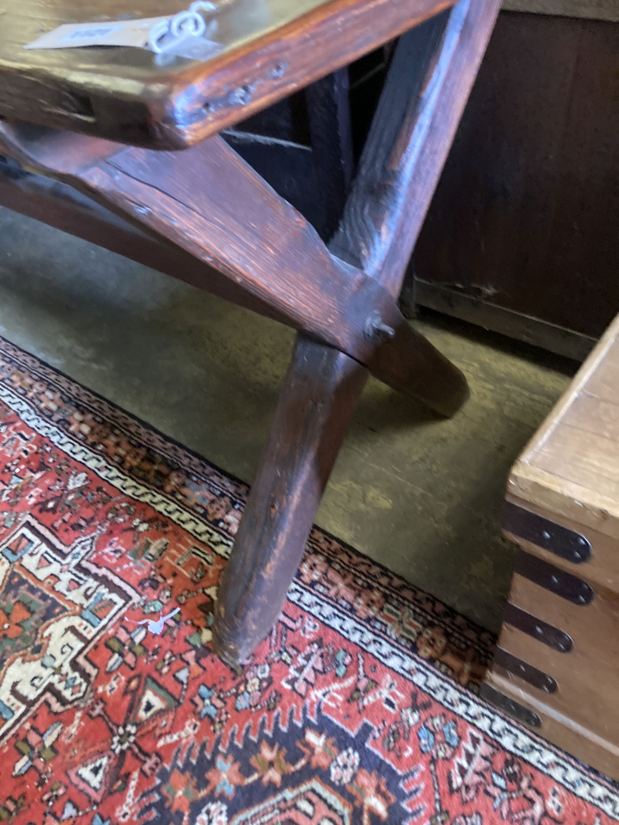 A 19th century pine refectory table, on trestle end supports, width 188cm, depth 68cm, height 77cm